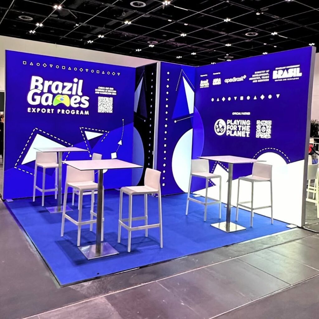 Caja de luz retroiluminada en textil para Brazil Games. Stand modular con gráficas de alto impacto visual, ideal para ferias gaming internacionales.